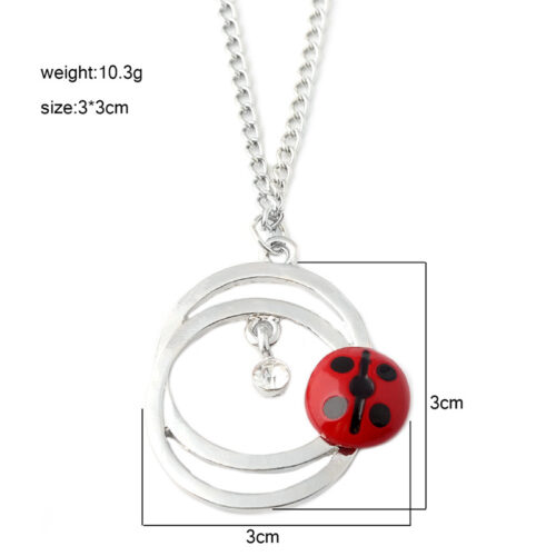 COLLIER EN FORME DE CHAT ET COCCINELLE