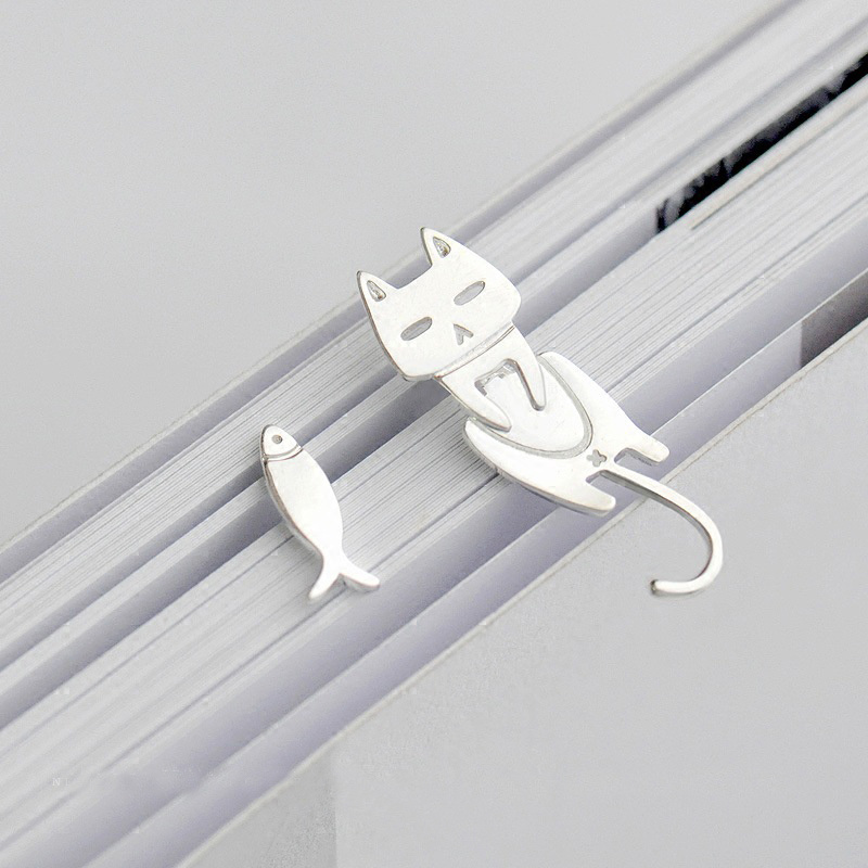 Boucles d’oreilles asymétriques en argent